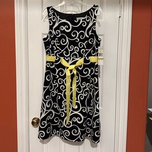 Stylish Black and White Swirl Dress with Yellow Accent
